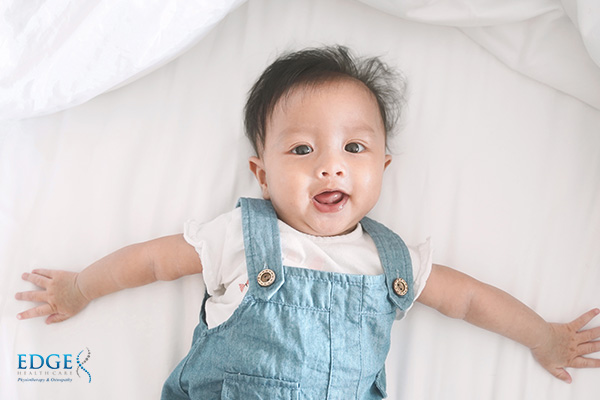baby smiling osteopathy singapore